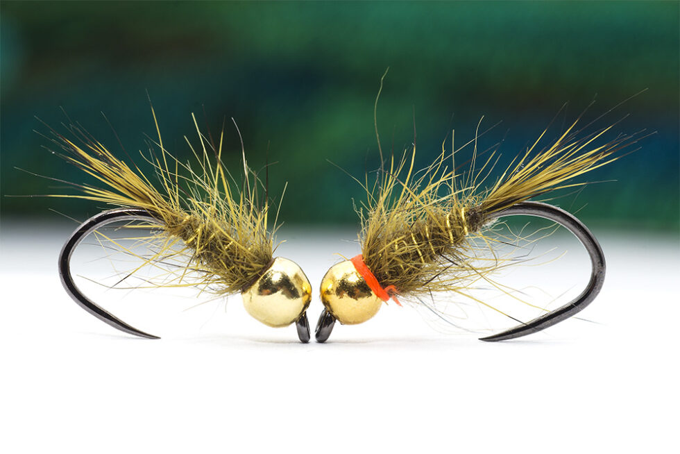 https://www.flytying.ro/wp-content/uploads/2023/10/olive-nymphs-tied-with-troutline-flytying-materials-980x654.jpg